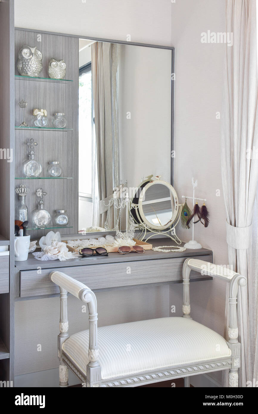 vintage style dressing room with classic white chair and dressing table  Stock Photo - Alamy