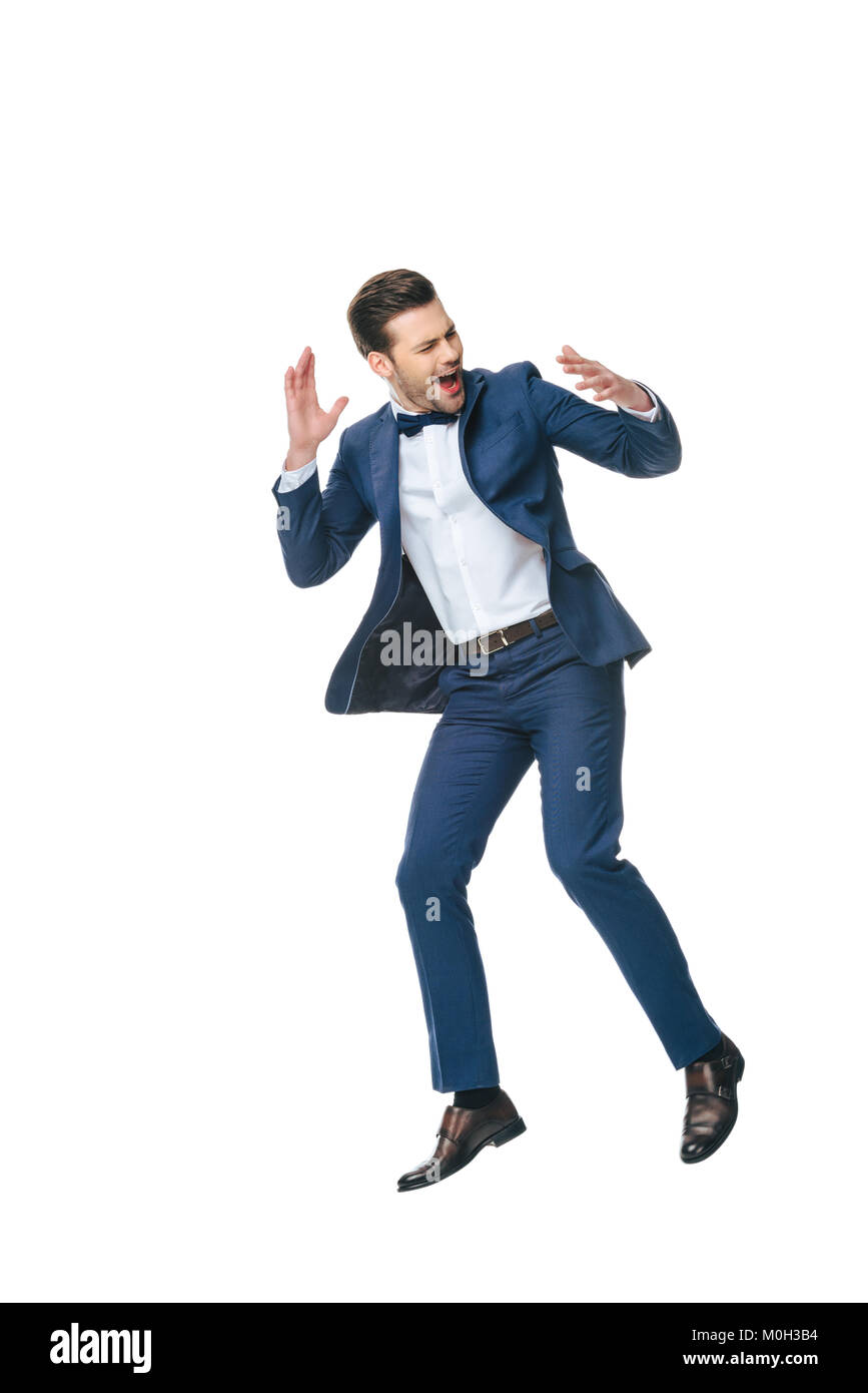 excited man in suit jumping isolated on white Stock Photo