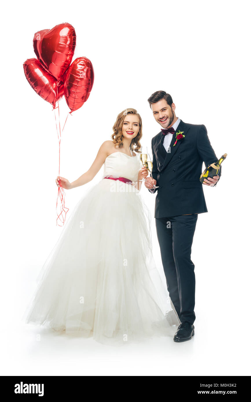 wedding couple with red heart shaped balloons and champagne isolated on ...