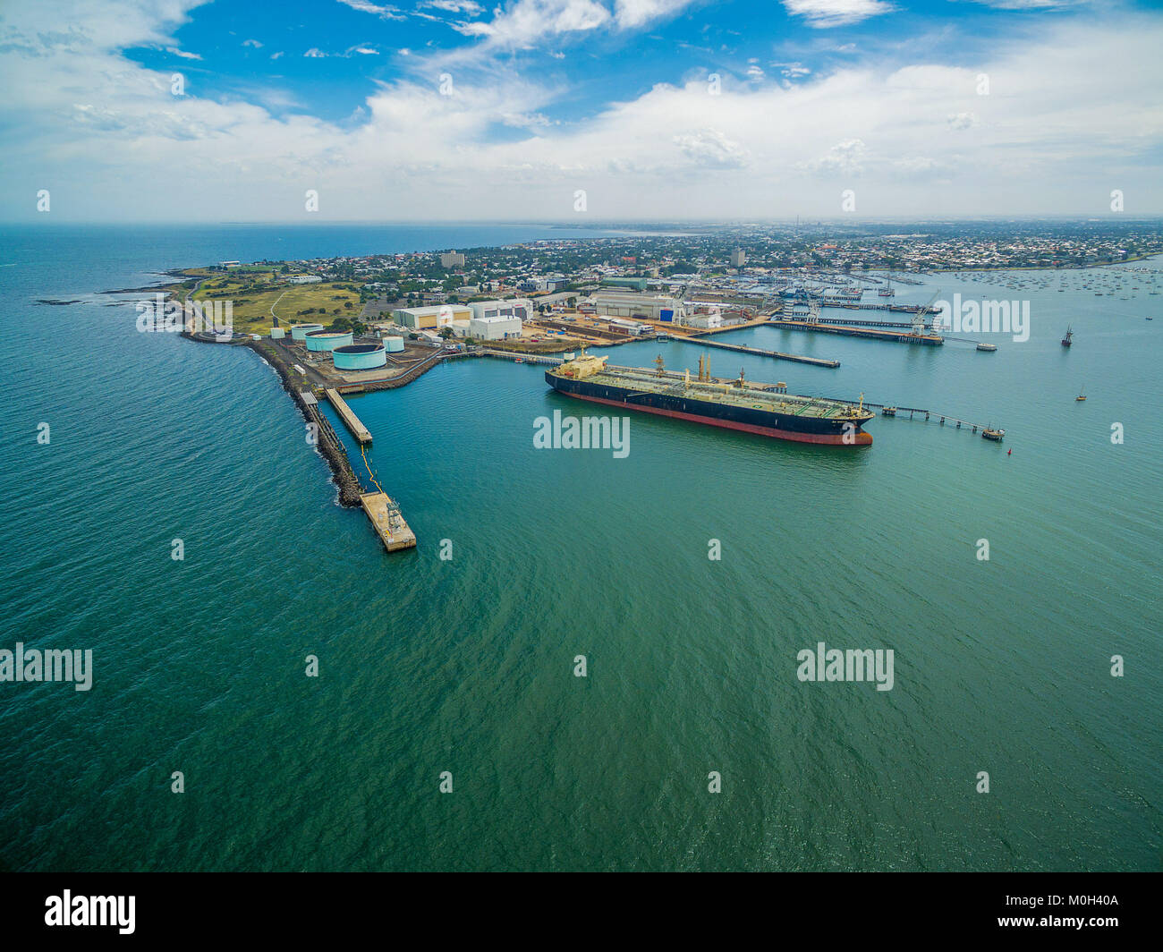 Aerial view of industrial docks and nautical vessel at Yarra river mouth. Williamstown, Melbourne, Australia Stock Photo