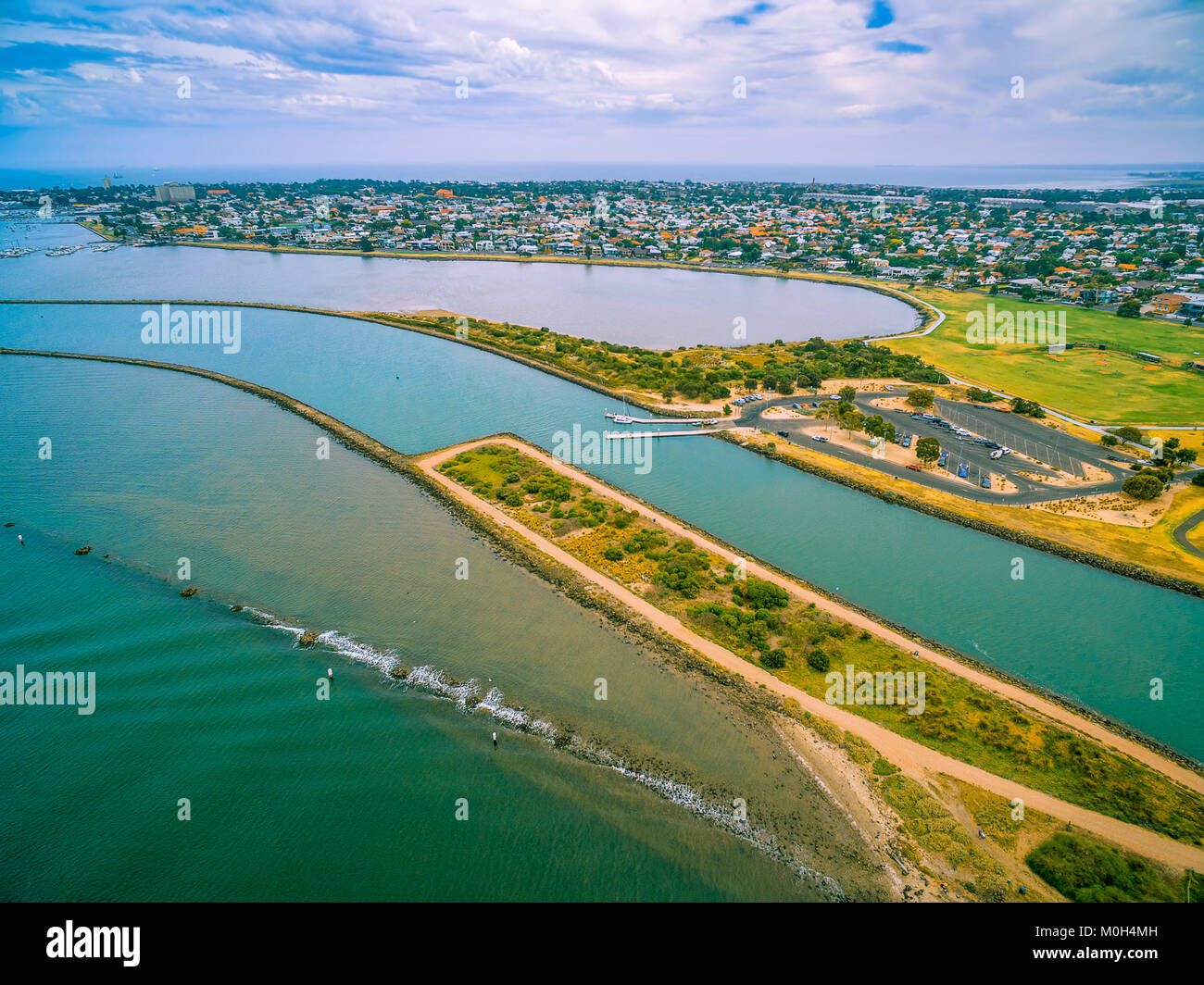Aerial view of Yarra river mouth and Williamstown coastal suburb in