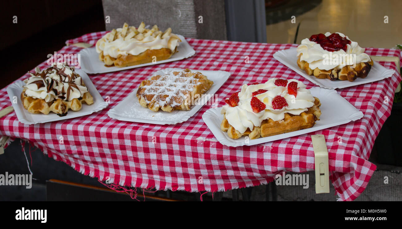 Belgian waffles selling in bakery shop in Bruges, Belgium Stock Photo