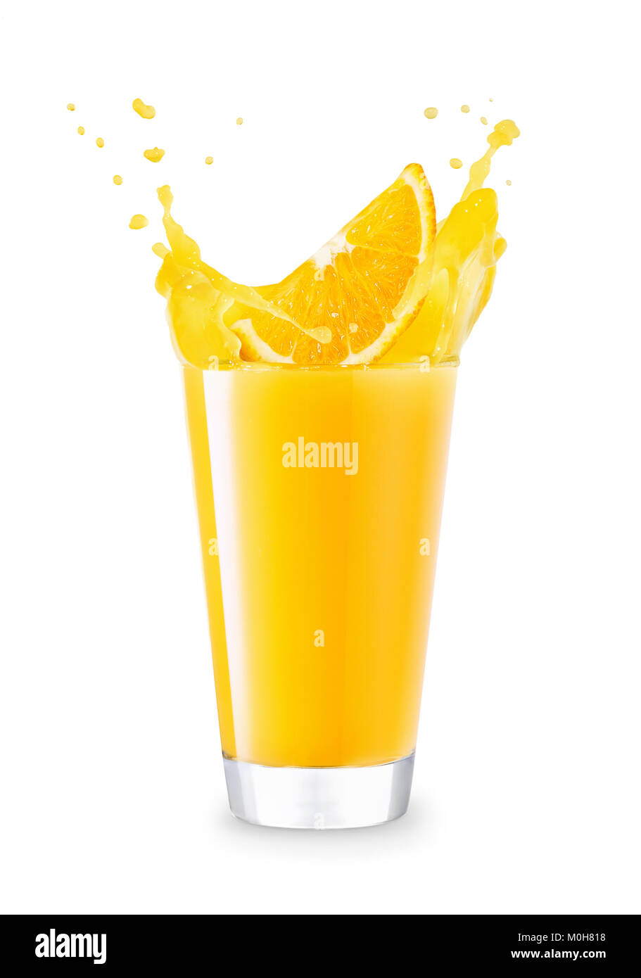 glass of splashing orange juice Stock Photo