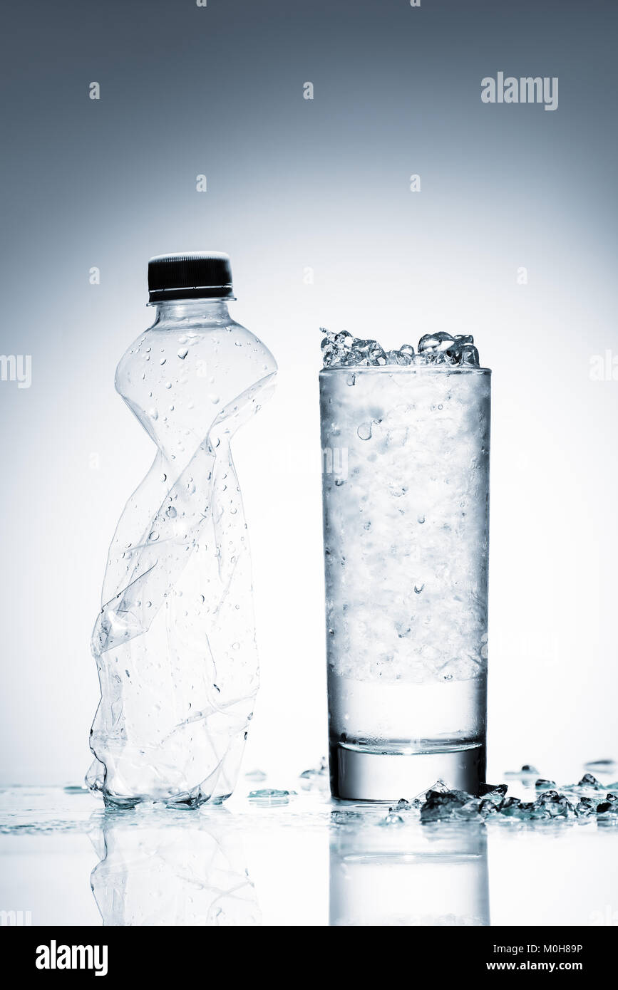 frozen water bottle for hiking partially thawed. bottle shape keeps ice  from floating Stock Photo - Alamy