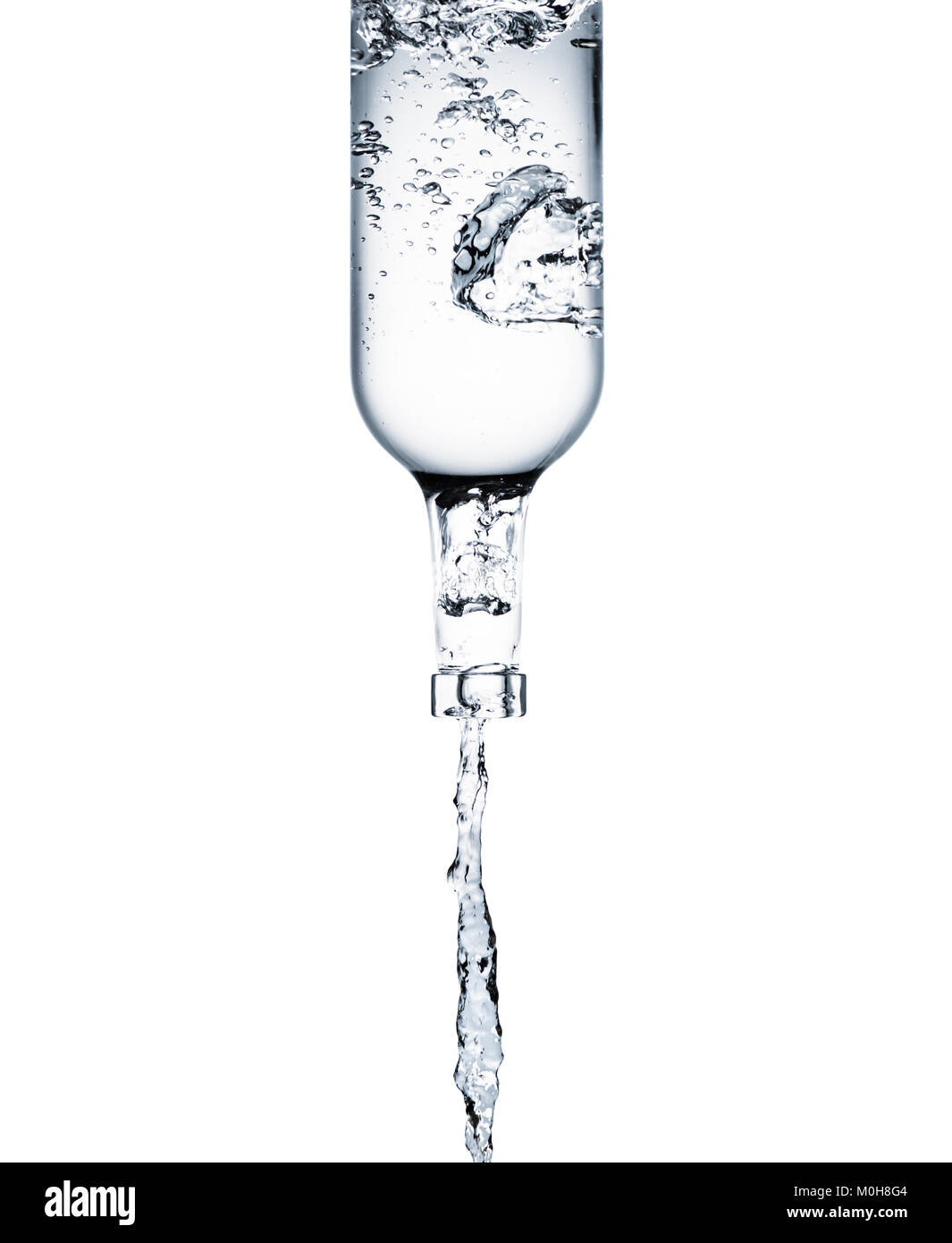 clean water pouring from glass bottle isolated on white Stock Photo Alamy
