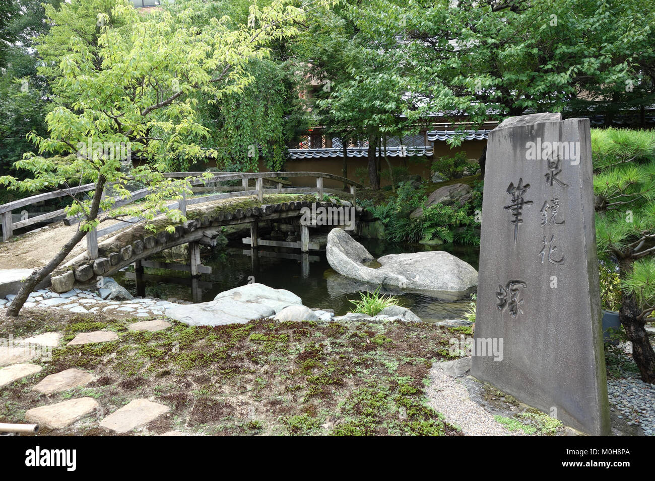 The Yushima Tenman-gu Bridge, located in Tokyo, Japan, is an iconic bridge that crosses over the sacred grounds of the Yushima Tenman-gu Shrine, known for its cultural and historical significance. Stock Photo