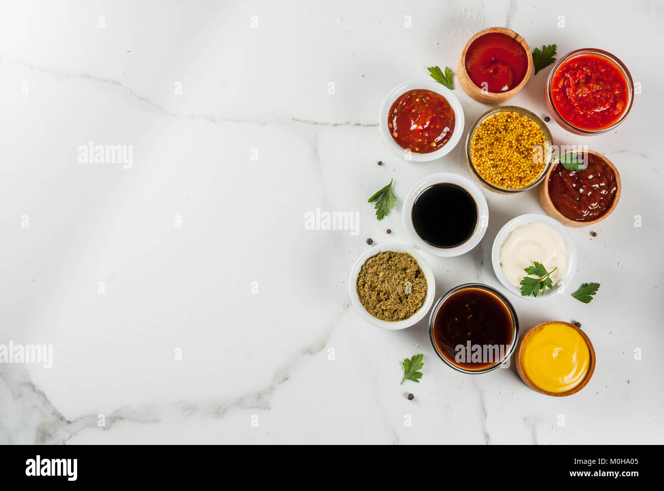 Set of different sauces ketchup, mayonnaise, barbecue, soy, teriyaki