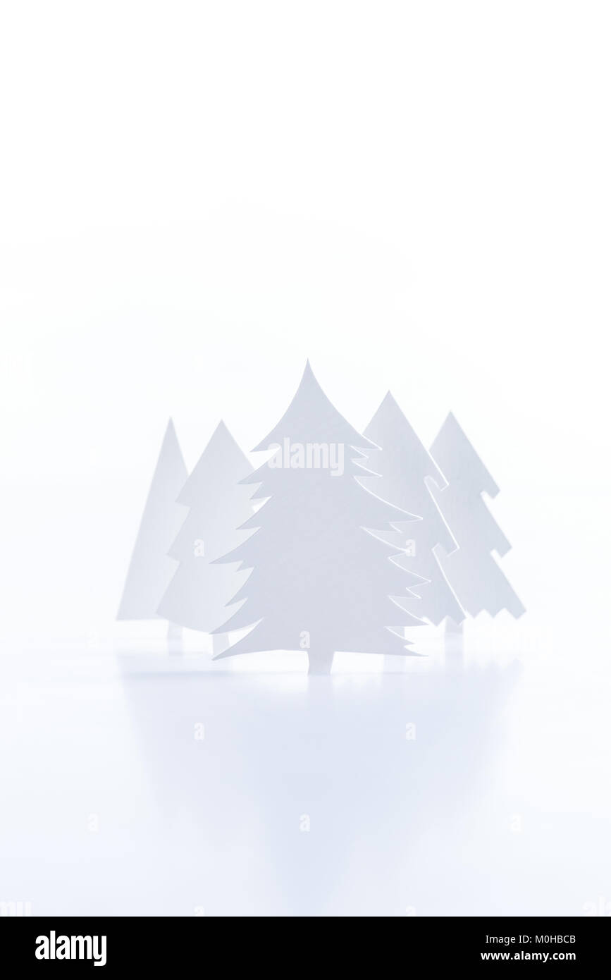 white paper christmas trees, isolated on white Stock Photo - Alamy
