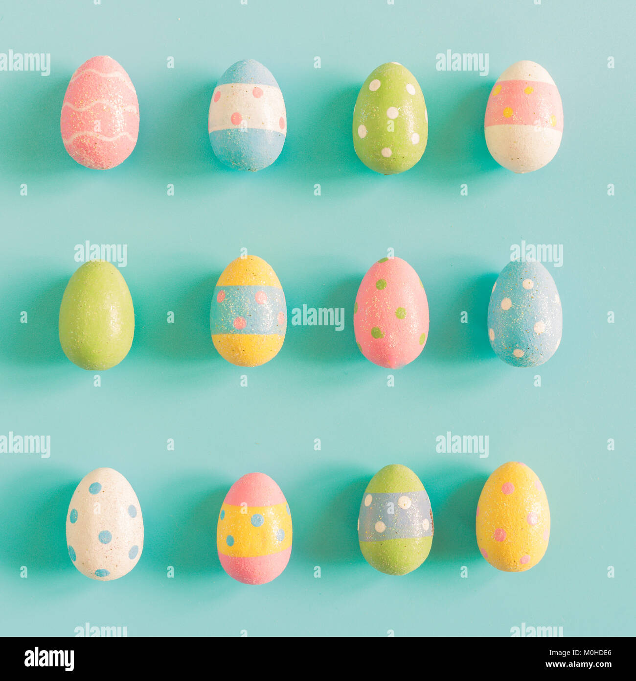 Colorful easter eggs on pastel color background with space Stock Photo ...