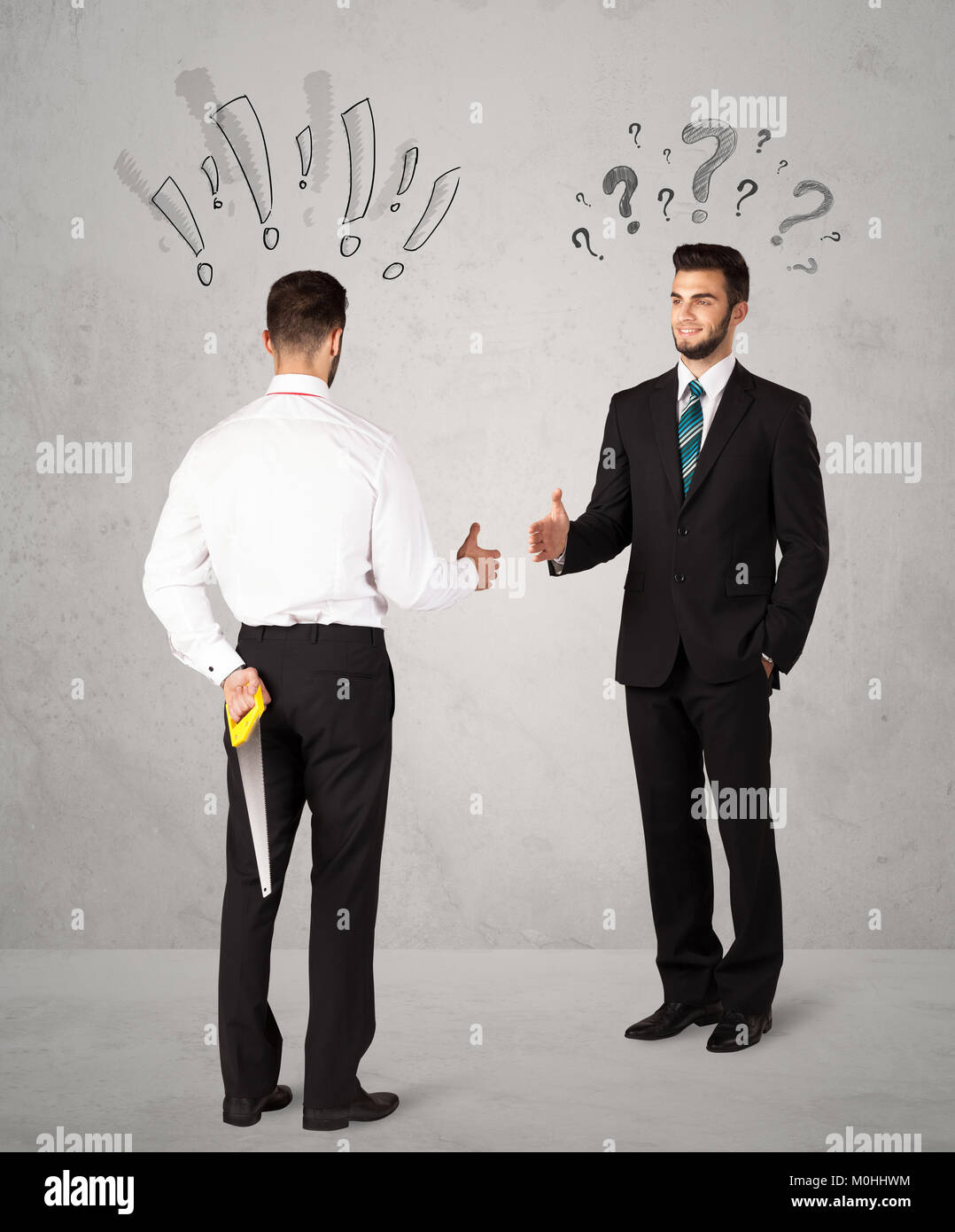 Ruthless businessman handshake with drawn exclamation and question