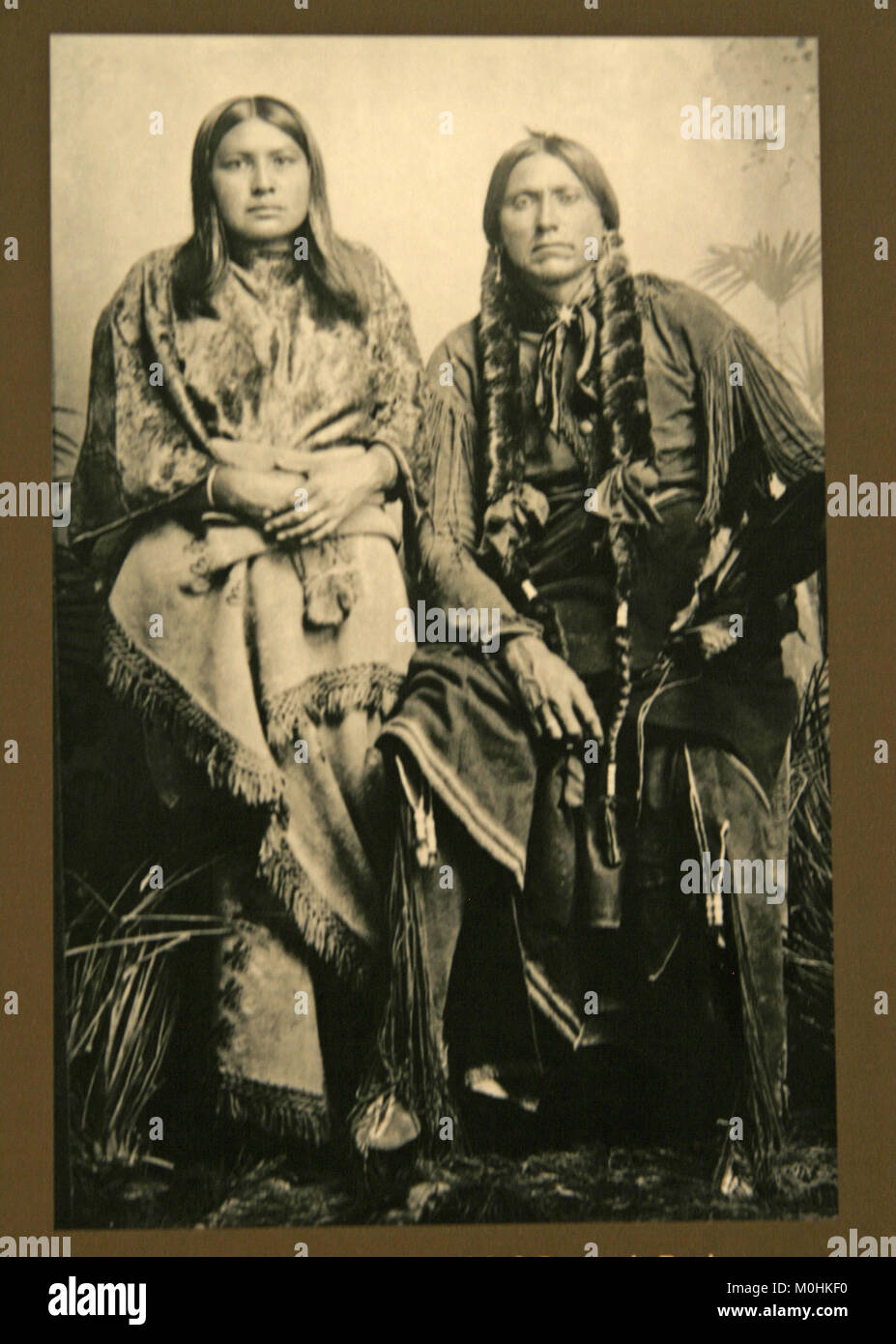 Portrait of the Comanche Chief Quanah Parker and his wife after his capture, 1875, Immigration Museum, Ellis Island, Upper New York Bay, New York City Stock Photo