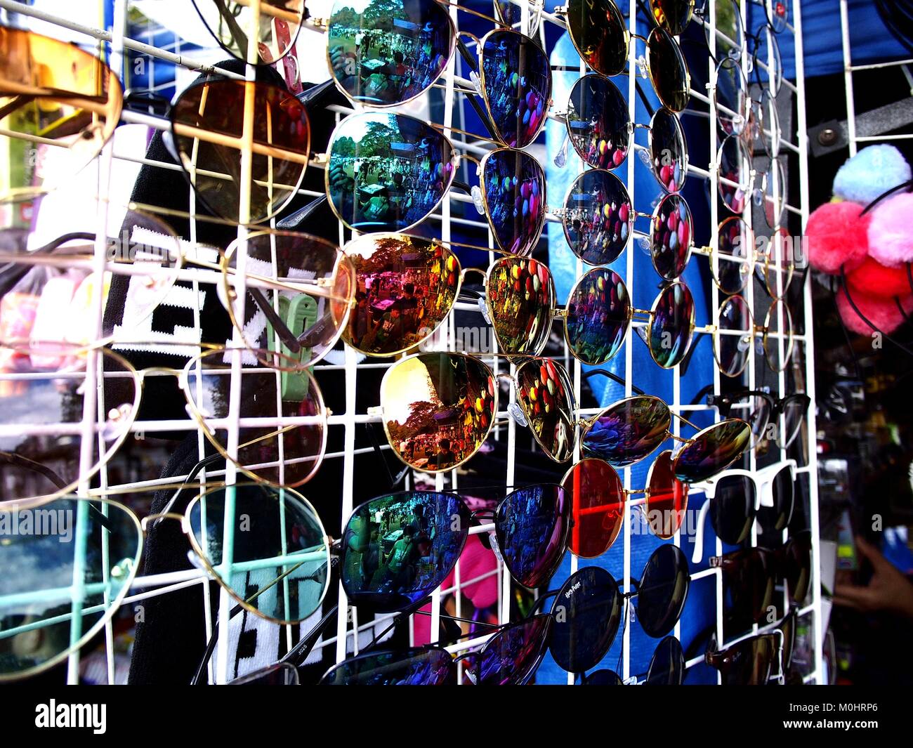 Photo of assorted eyewear on display at a bazaar store Stock Photo Alamy