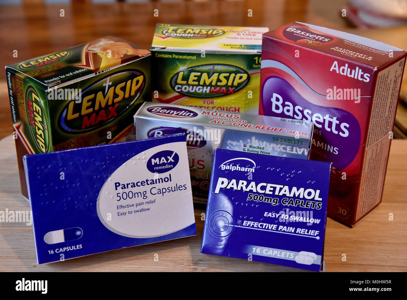 A selection of cold and flu remedies. Including Paracetamol tablets,  multivitamins and Lemsip Max Stock Photo - Alamy