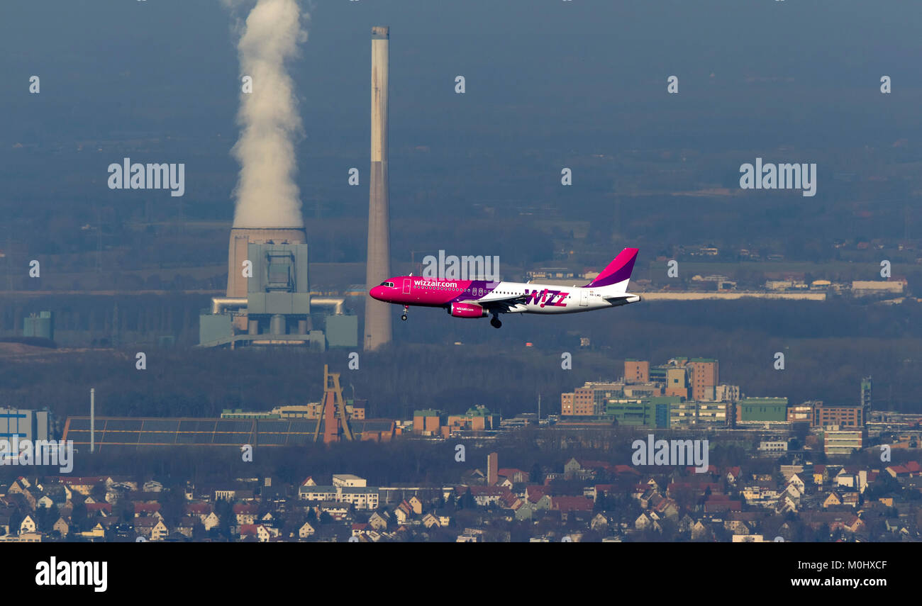 Aerial view, approach a WIZZAIR passenger jet on the runway 25 of the Dortmund Flight harbor, before the city gate of Bergkamen, Dortmund, Ruhr, Nordr Stock Photo