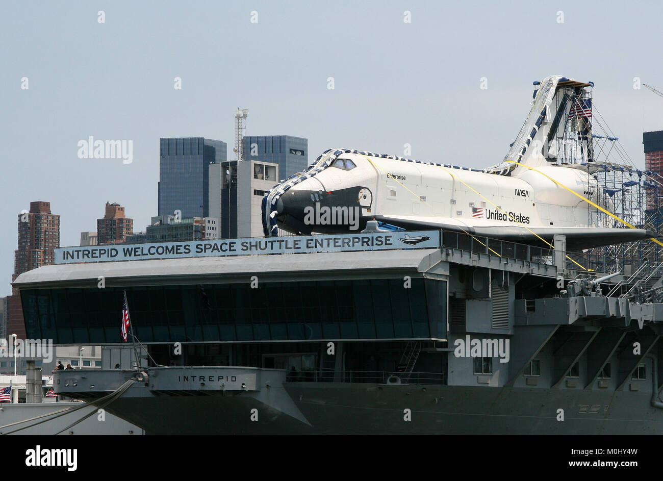 The Enterprise Space Shuttle on the Intrepid Battleship at The Intrepid Sea, Air & Space Museum on the shore of the Hudson River, Manhattan, New York  Stock Photo