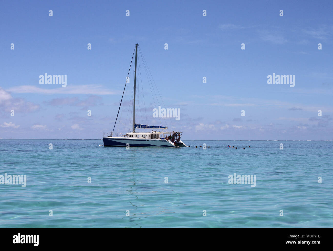 The Oceane V, a Catamaran Cruise boat in the open sea near the shores of Ile Aux Cerfs, The Republic of Mauritius, Flacq District. Stock Photo