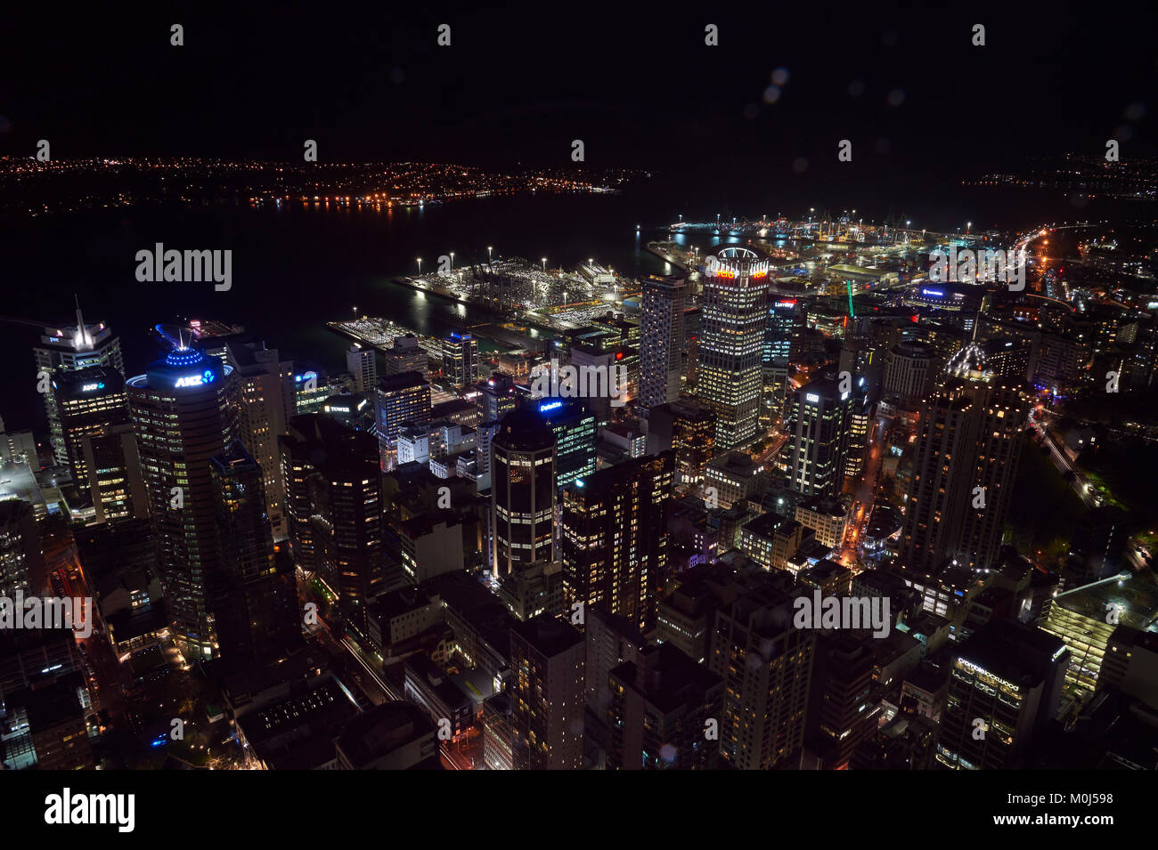 View at night over Auckland from observation deck at Sky Tower Stock Photo