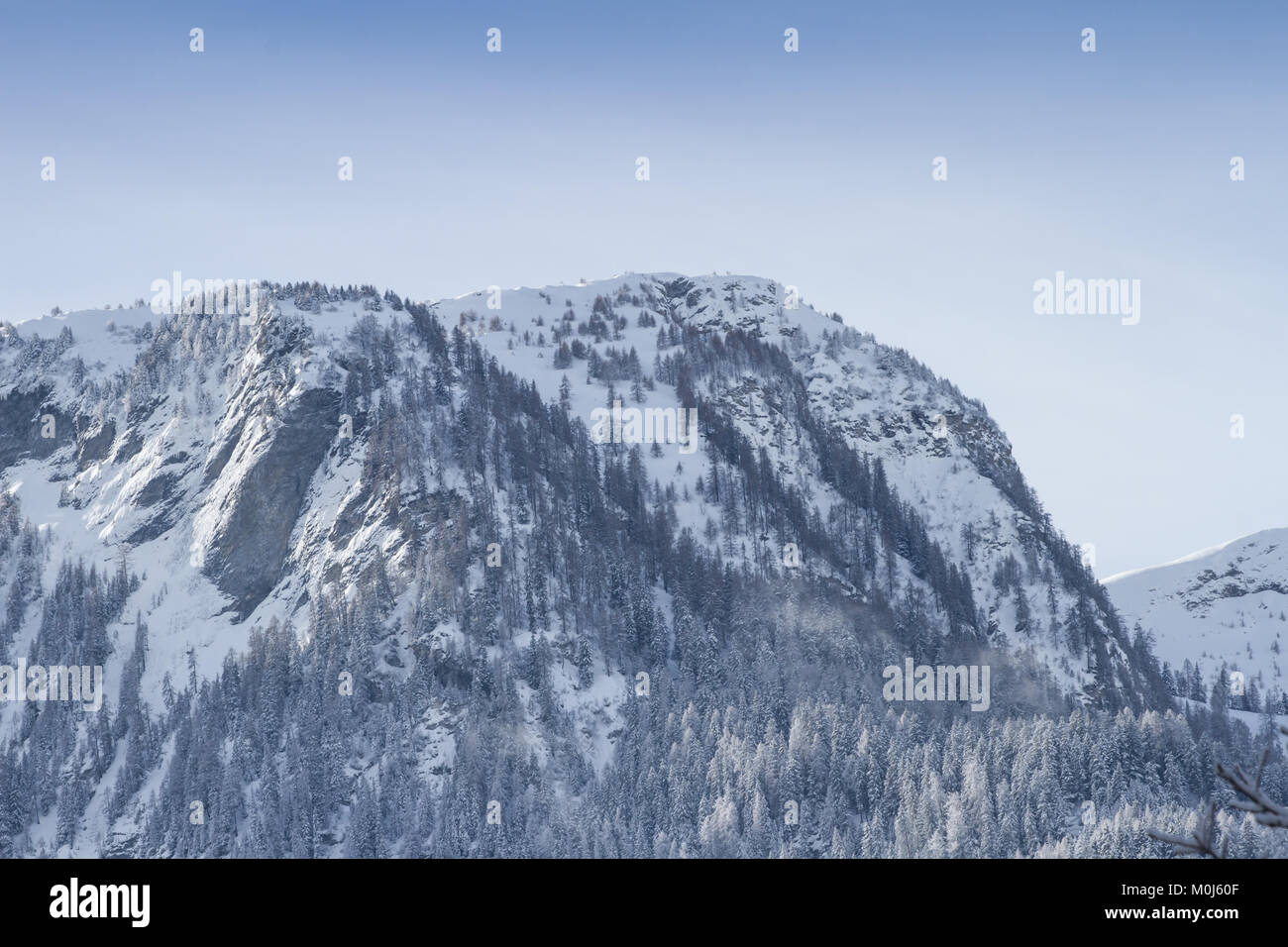 Mountains in the Canton of Grisons (Graubünden), Switzerland, in the winter, snow Stock Photo