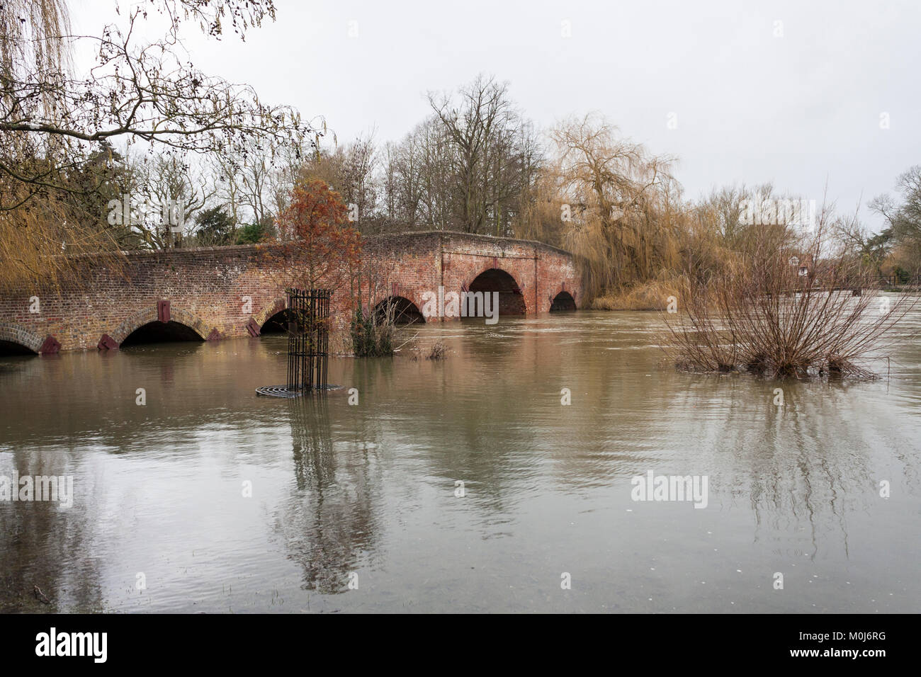 Sonning Bridge over the river Thames at Sonning on Thames in full flood. Stock Photo