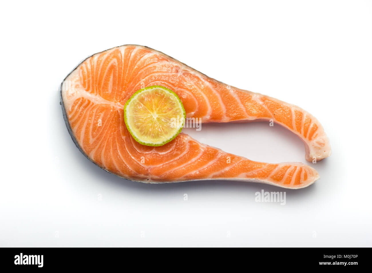 salmon steak on white background Stock Photo - Alamy