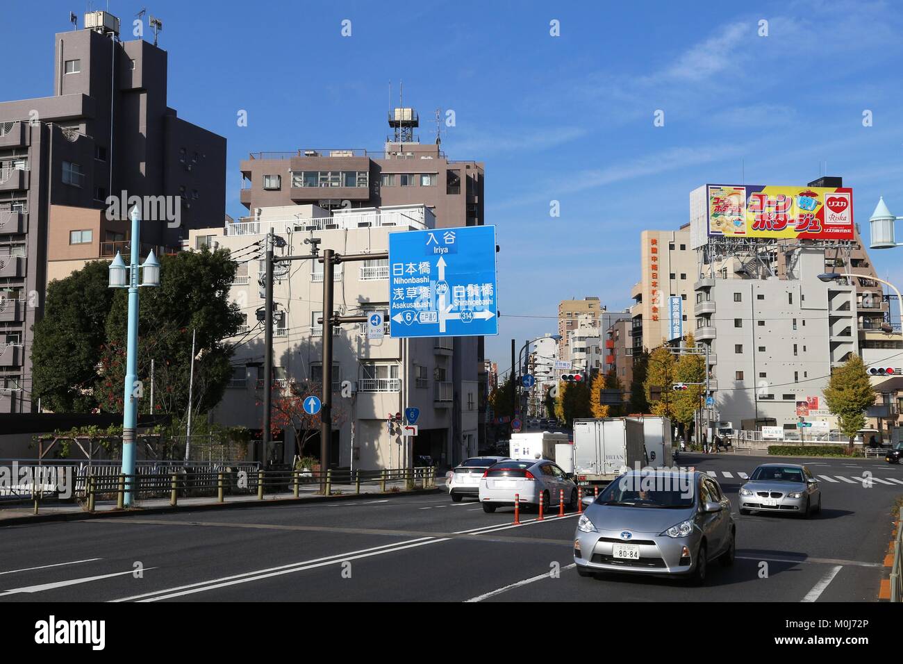 TOKYO, JAPAN - NOVEMBER 30, 2016: People drive in Taito ward in Tokyo ...