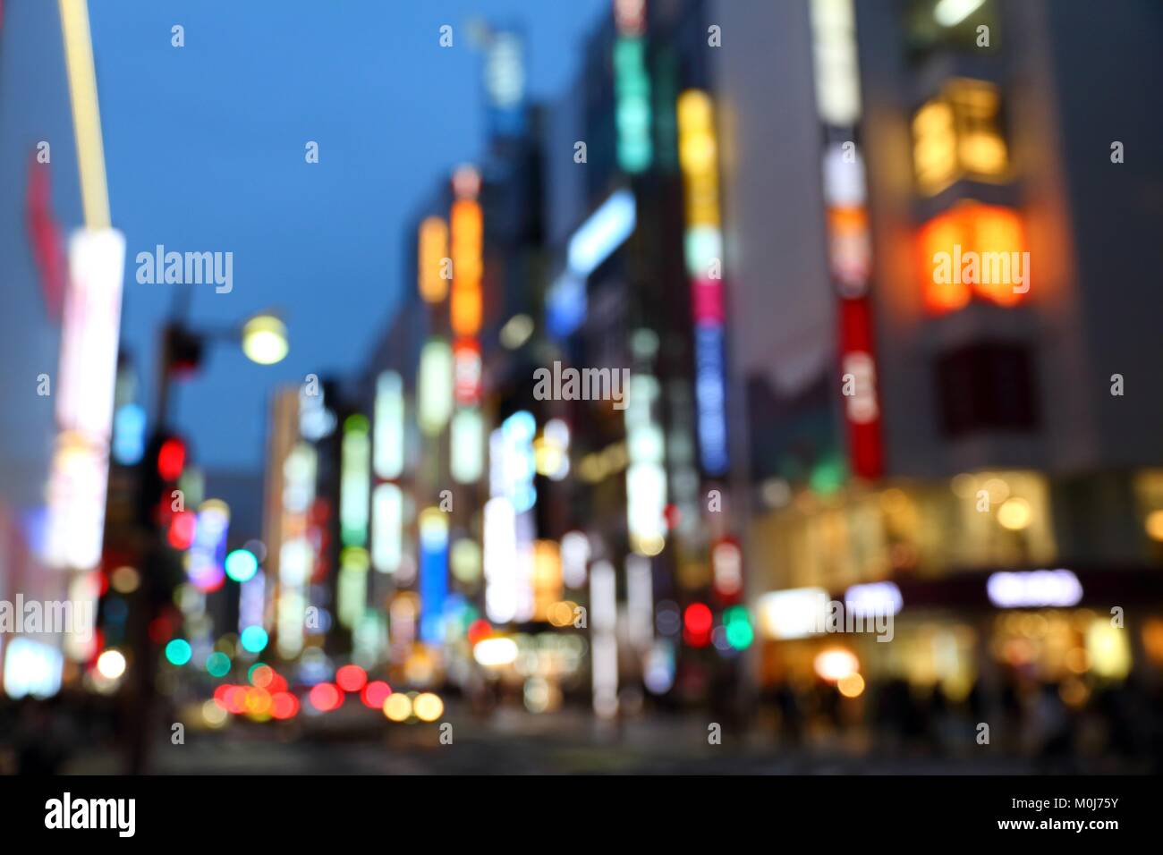 Tokyo night. Big city lights - defocused Tokyo, Japan. Blurred colorful neons. Stock Photo