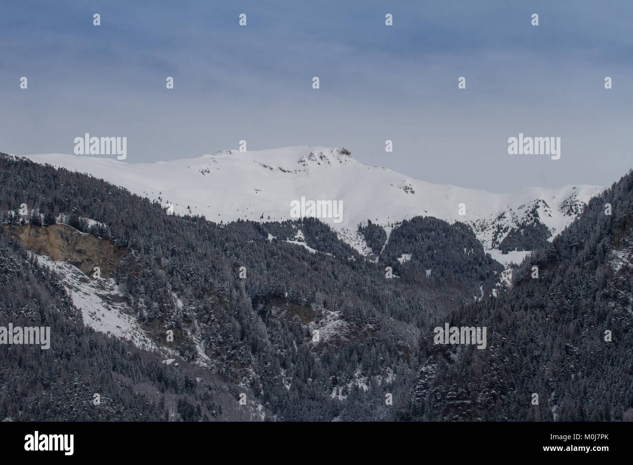 Mountains in the Canton of Grisons (Graubünden), Switzerland, in the winter, snow Stock Photo