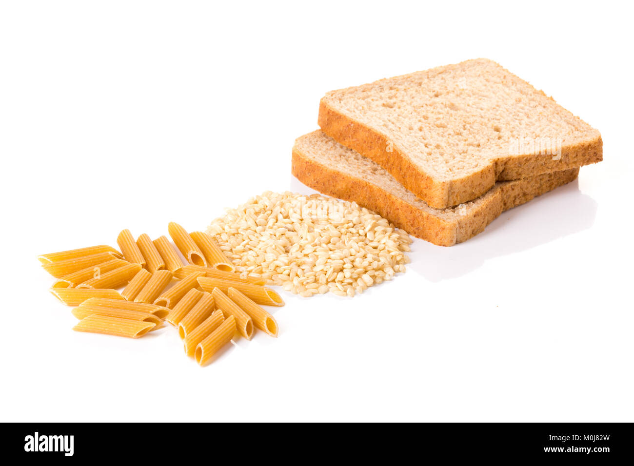 Carbohydrate pasta, rice and wholemeal bread on white background Stock Photo