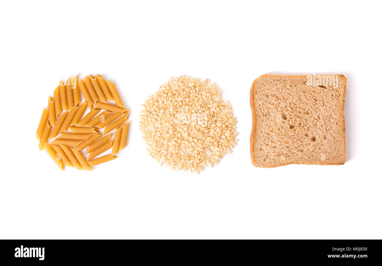 Carbohydrate pasta, rice and wholemeal bread on white background Stock Photo
