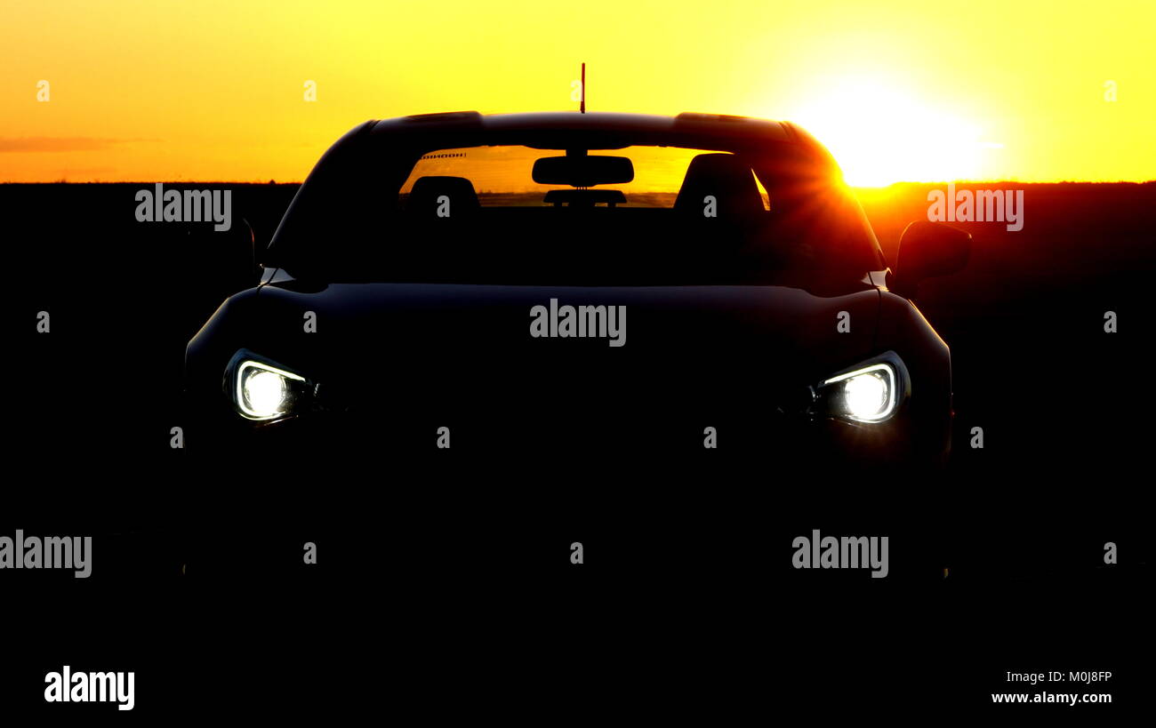 Sports Car Sunrise Stock Photo