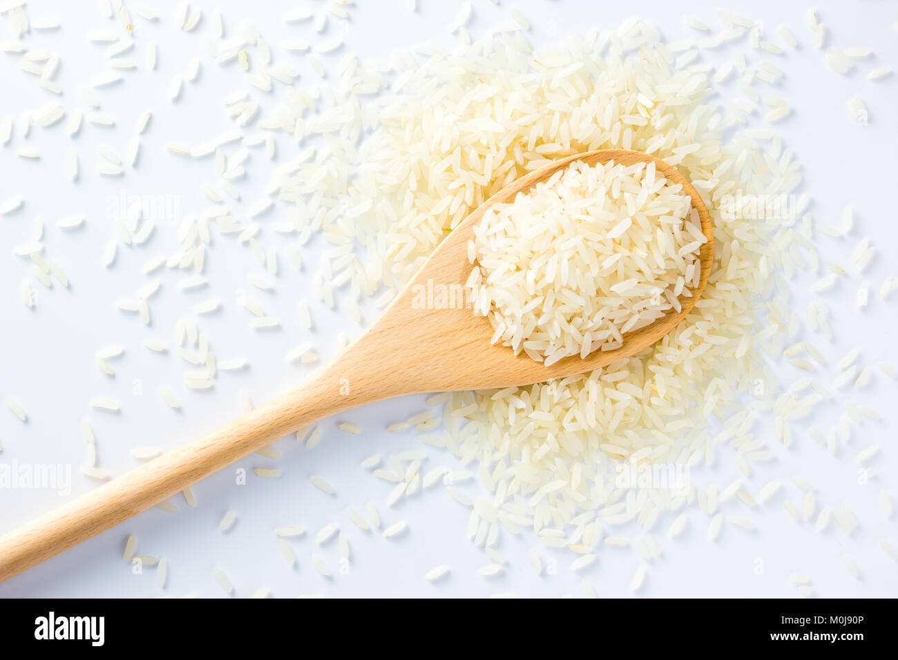 Rice on white background, top view Stock Photo - Alamy