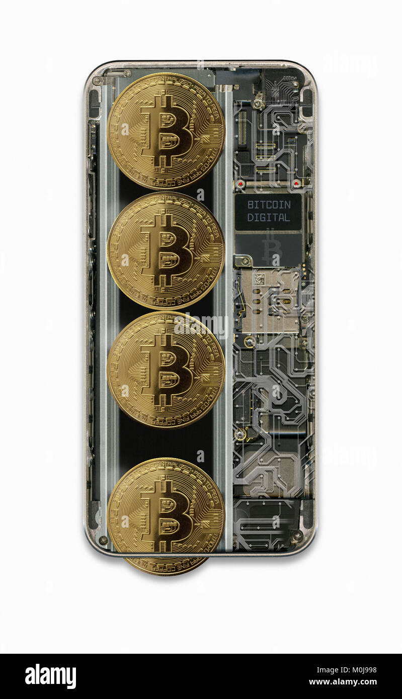 Section through a mobile phone showing Bitcoin tokens paying out Stock Photo