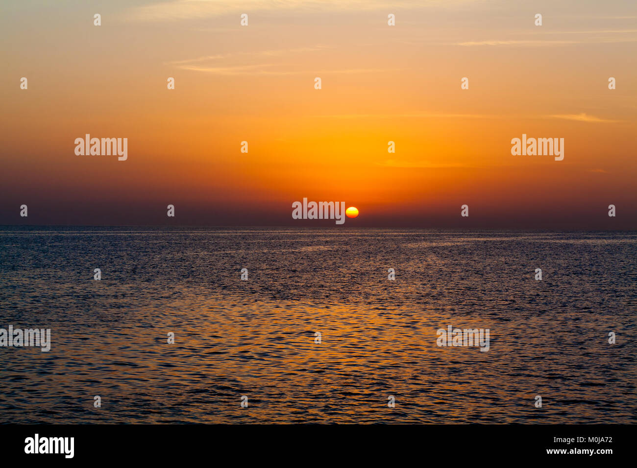 Beautiful sunset above the sea. sunset sky background Stock Photo - Alamy