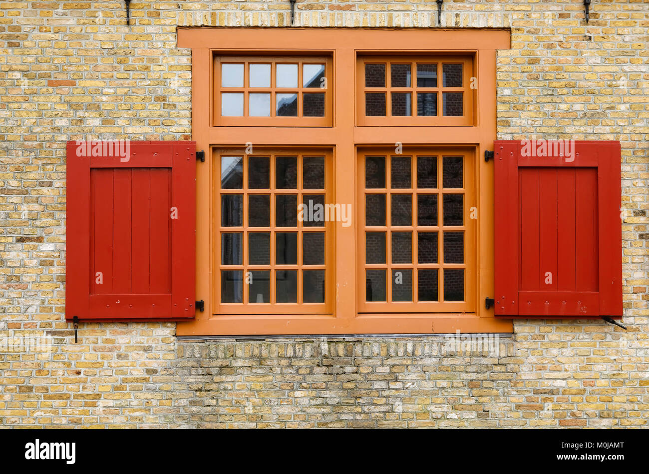 old red wooden window on brock wall Stock Photo - Alamy