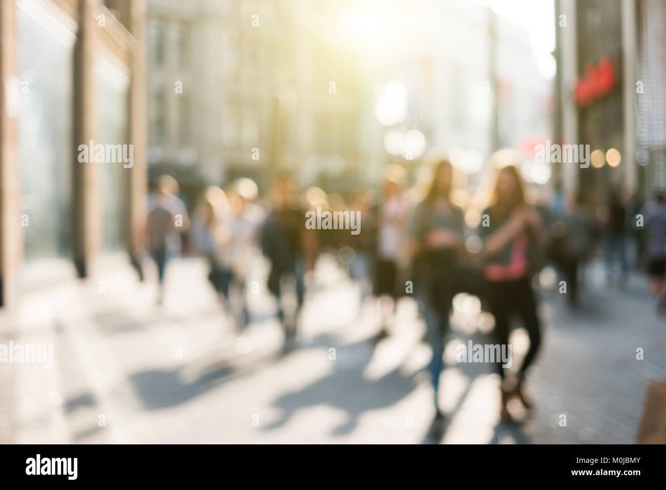 blurred people in a shopping street Stock Photo