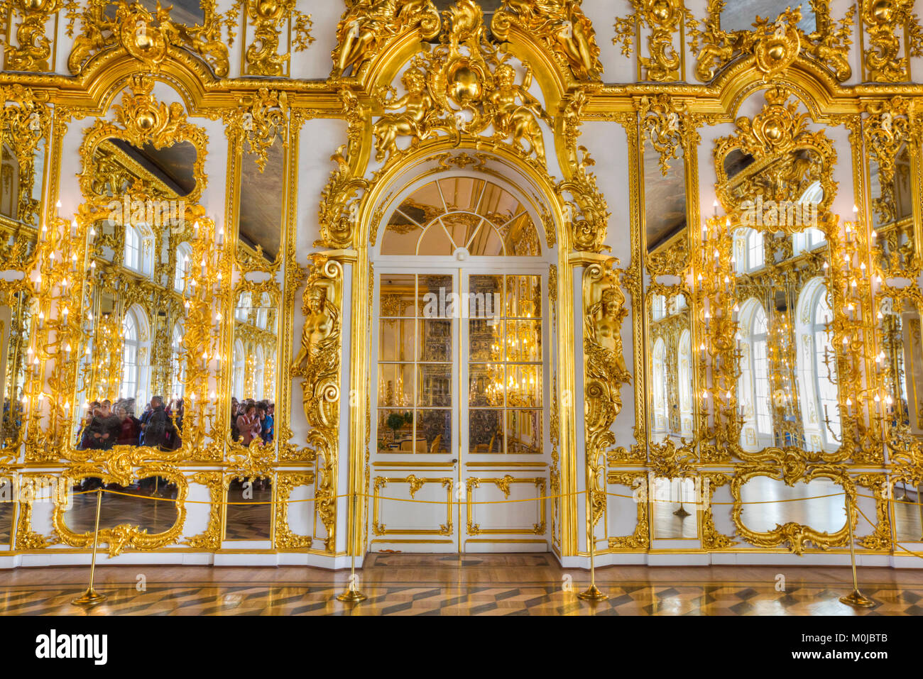 Ornate decorative walls in gold designs in the Great Hall, Catherine Palace; Tsarskoye Selo, Pushkin, Russia Stock Photo