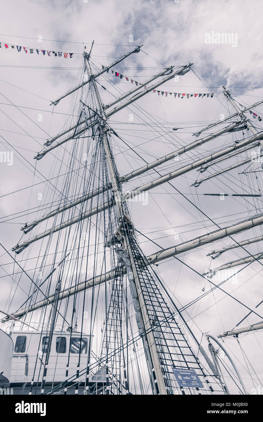 Old sailing ship mast. Tall ship rigging detail. Masts and rigging of a sailing ship Stock Photo