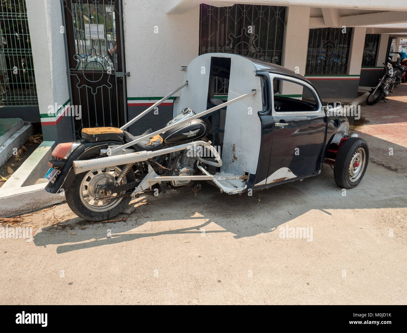 A One Off Custom Motorbike And Vintage Car Made Into One Three Wheeled Vehicle Motorcycle Izuka Santa Cruz Bay Mexico, Stock Photo