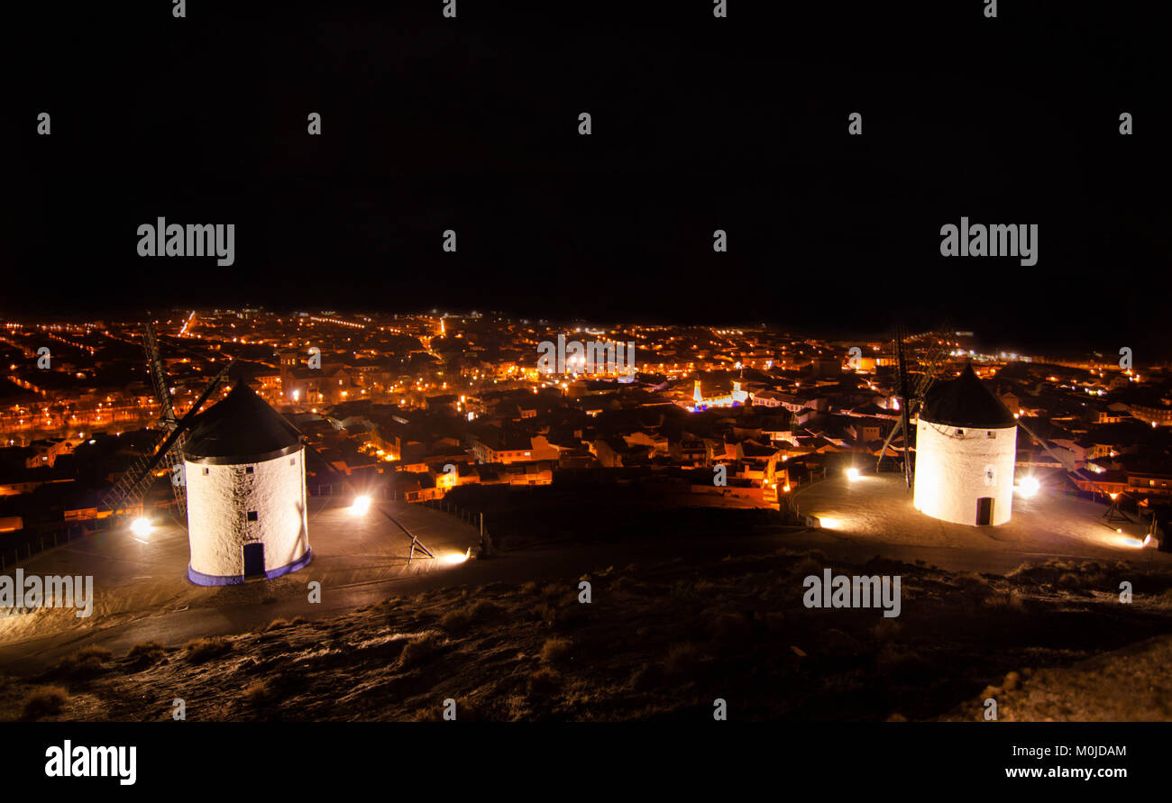 Consuegra, Toledo province, spain, night landscape photography, citylights and windmills Stock Photo