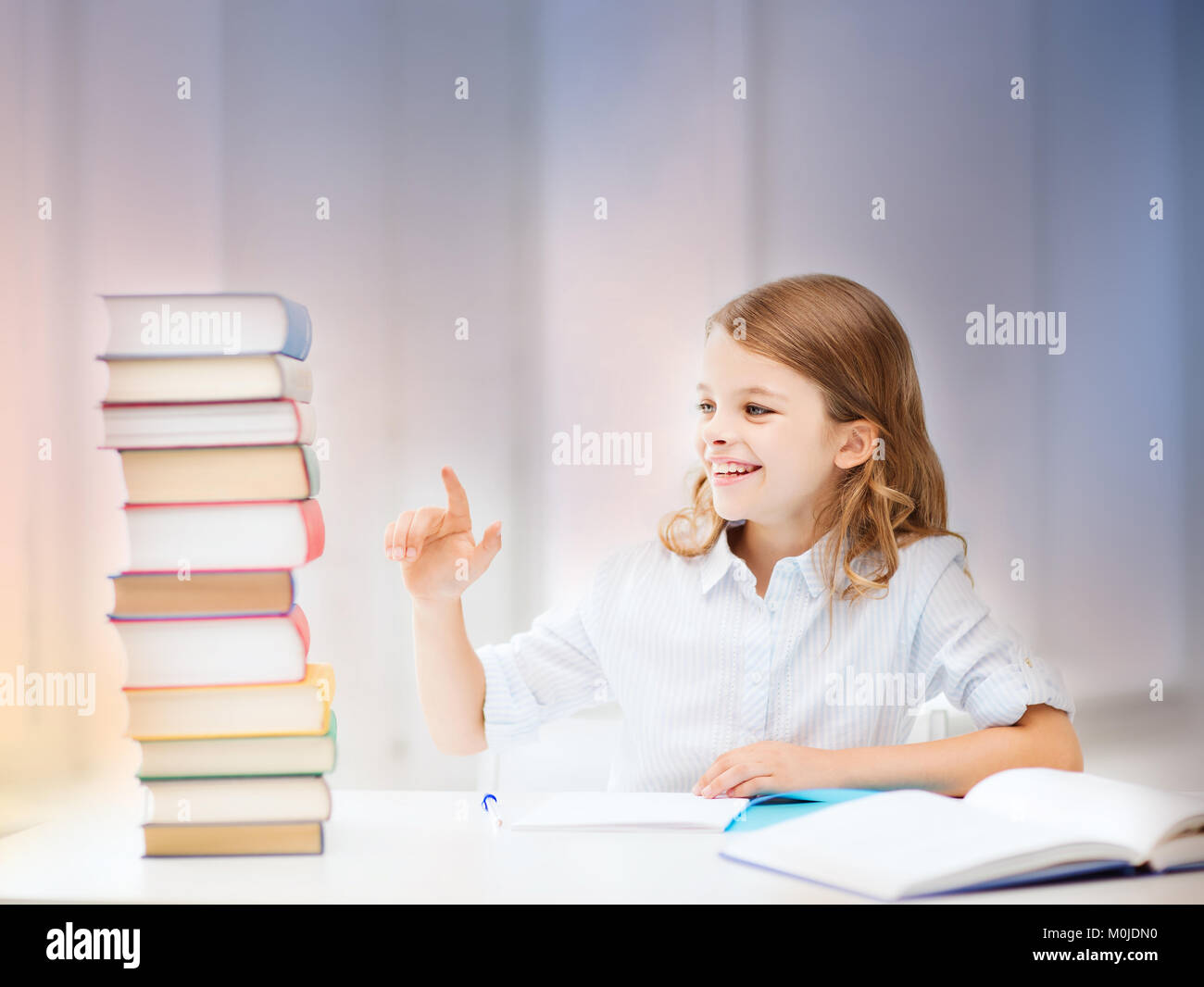 happy smiling student girl counting books Stock Photo - Alamy