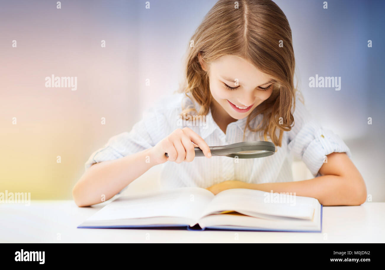 happy smiling student girl reading book Stock Photo - Alamy