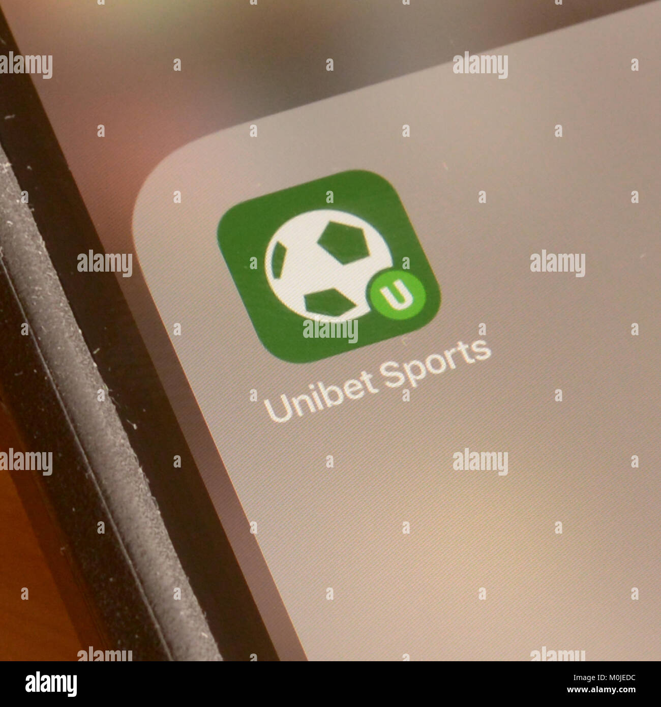 Smart phone screen showing Unibet Sports bookmaker gambling app or  application Stock Photo