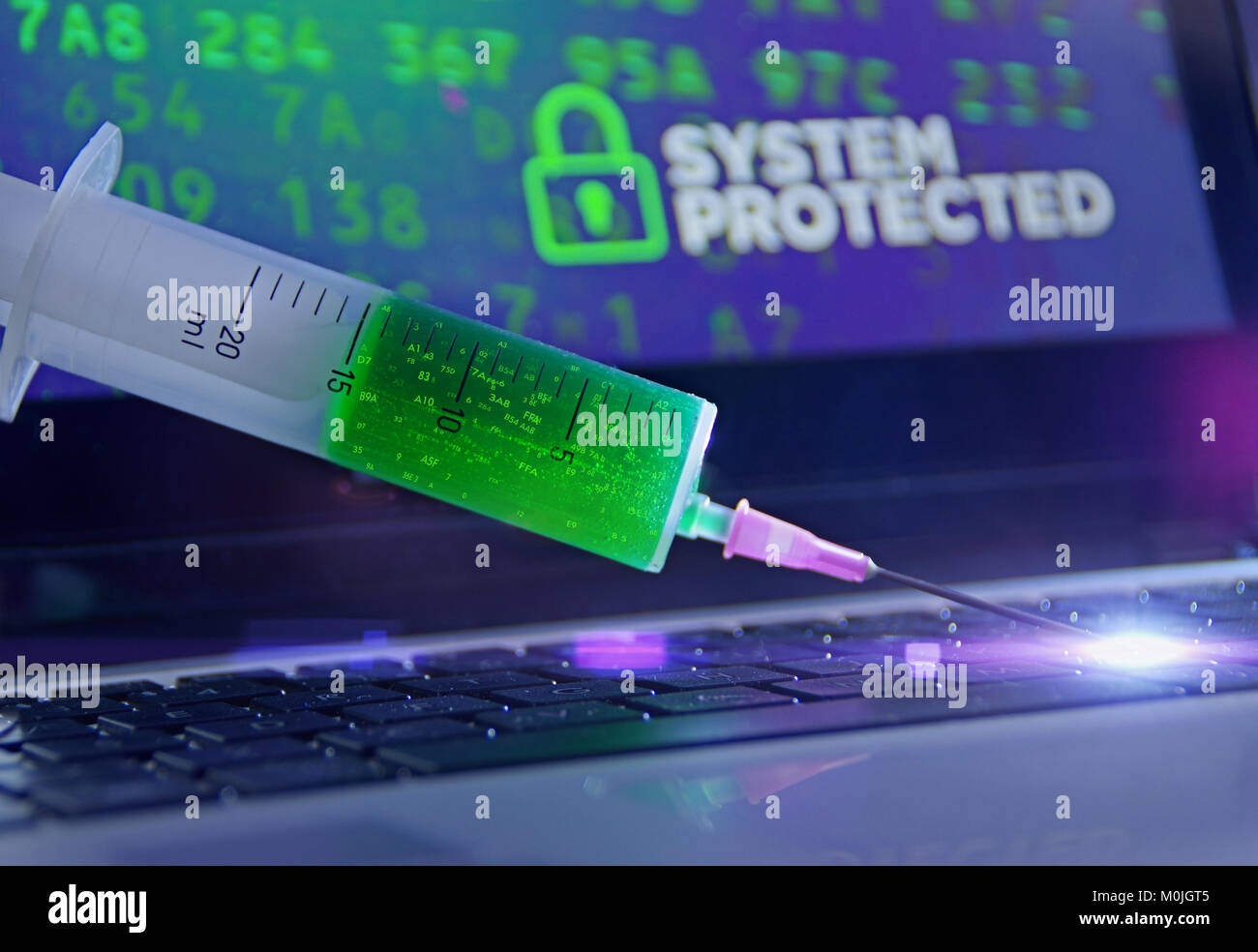 Antivirus vaccination in the syringe applied to the computer. System protection concept and cybersecurity. Stock Photo