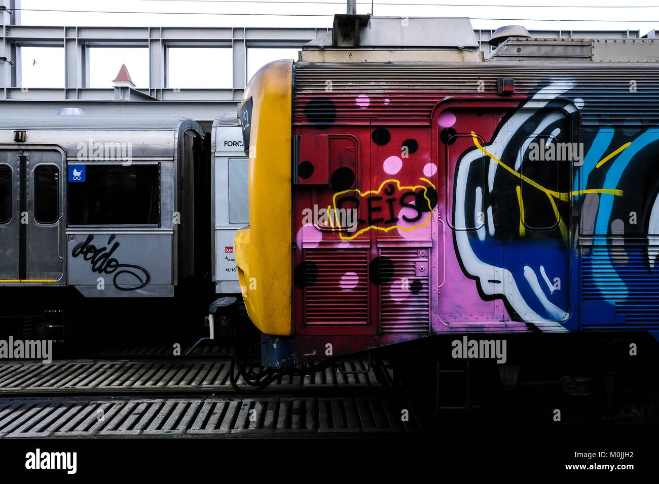 Graffiti work on a train car at the train station of Lisbon, Portugal. Stock Photo