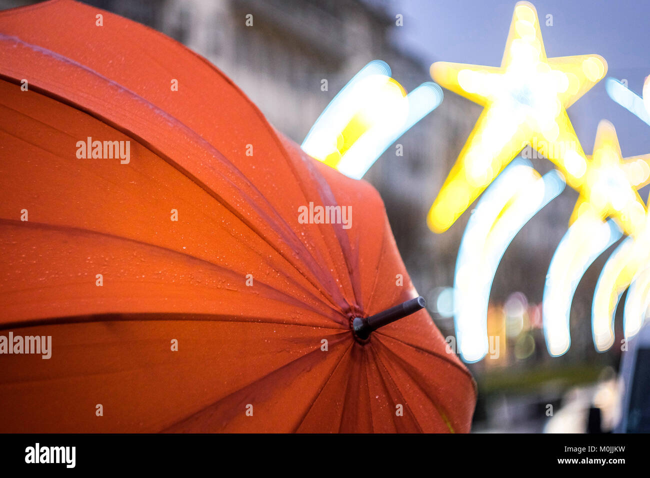 Pedestrians with umbrellas walking around in a rainy day Stock Photo ...
