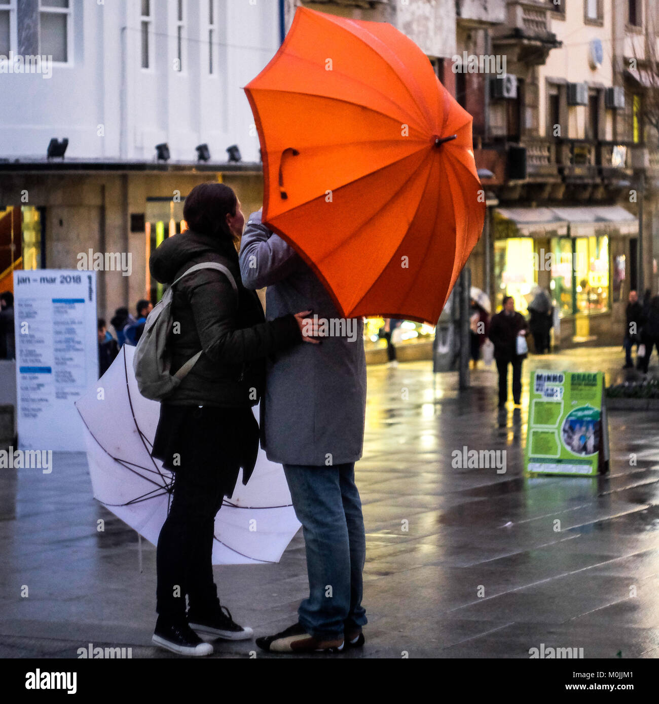 Pedestrians with umbrellas walking around in a rainy day Stock Photo ...