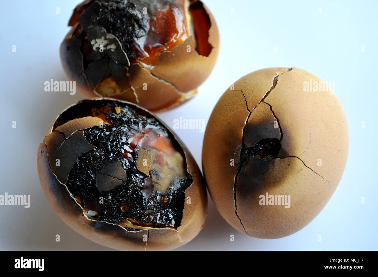 Burnt Boiled Eggs On White Background Stock Photo Alamy