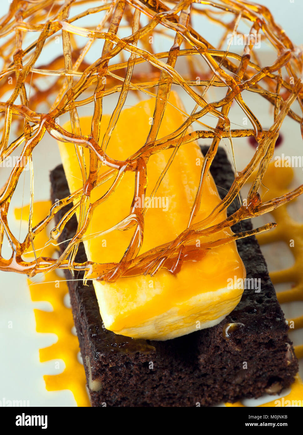 Caramel and chocolate cake decorated gourmet closeup Stock Photo