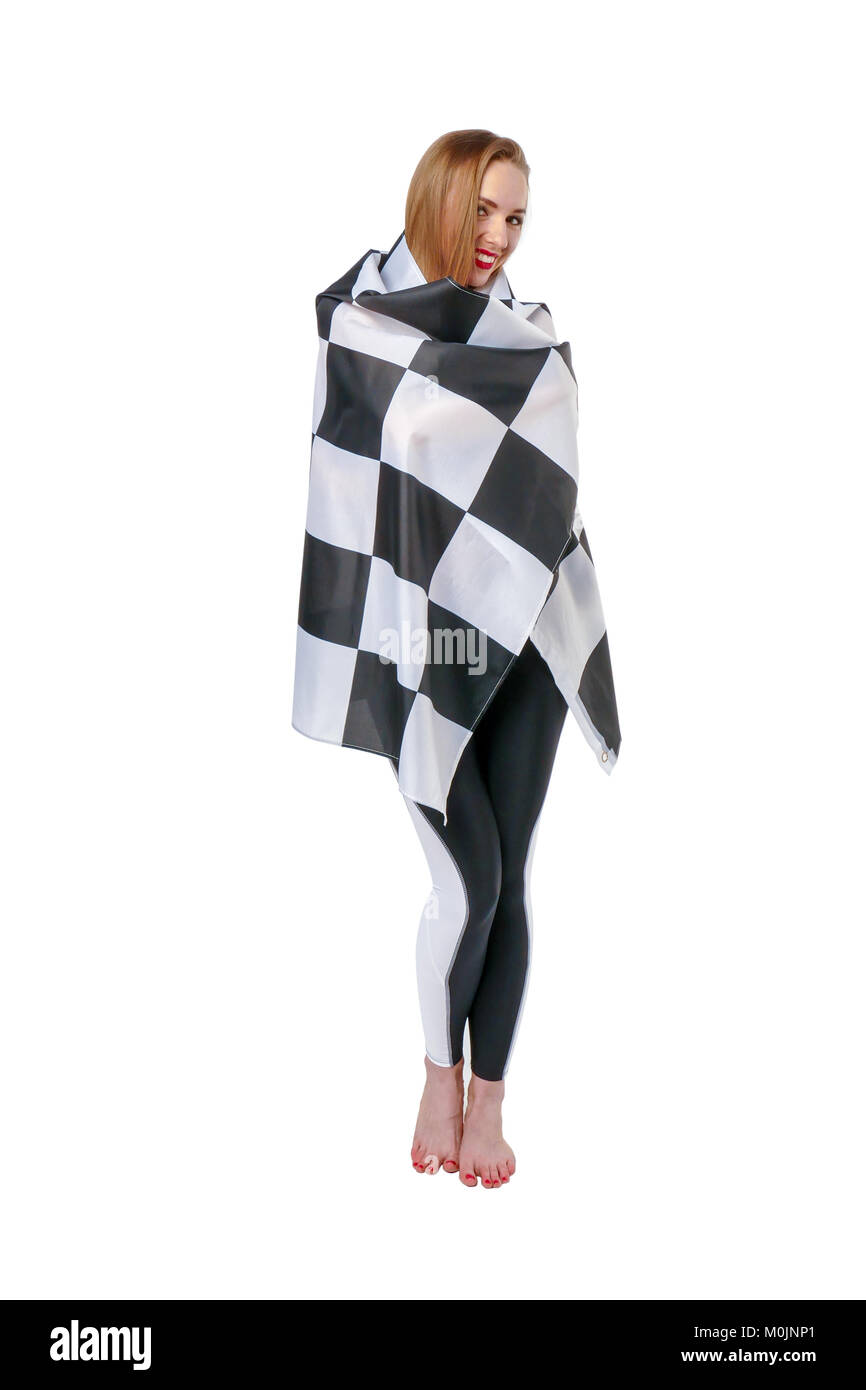 Woman is holding race checkerd flag.  Stock Photo