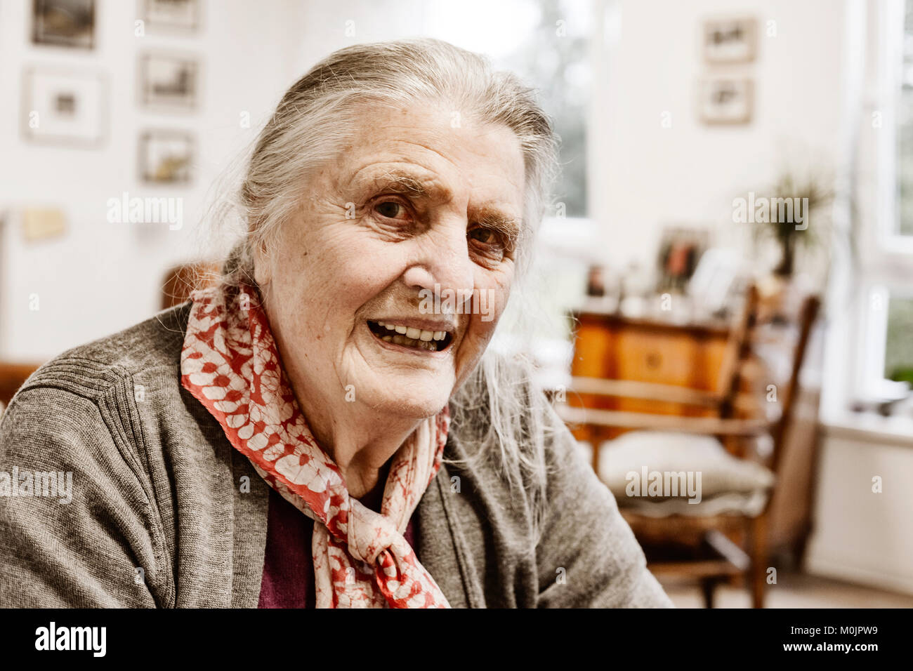 Senior citizen in her room in a senior citizen's home, portrait, Jan Tepass, North Rhine-Westphalia, Germany Stock Photo